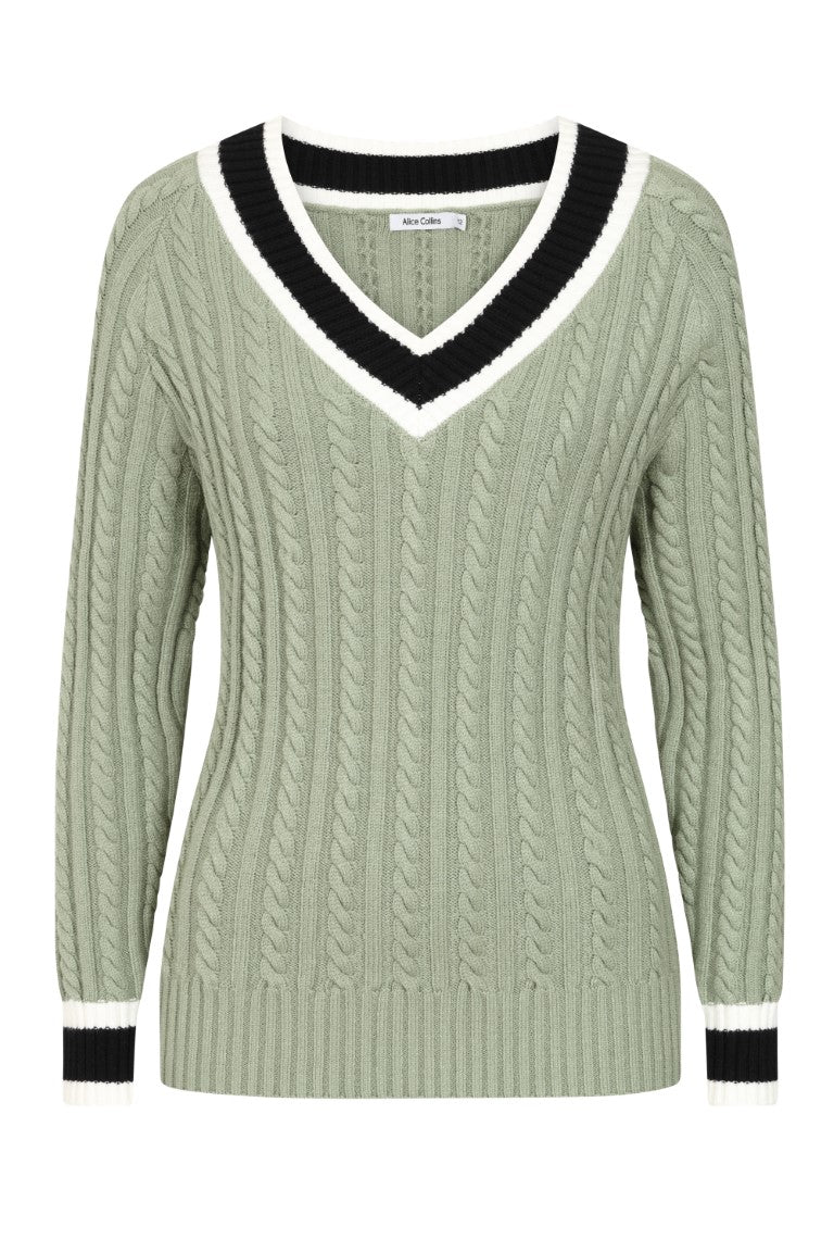 Green cable knit sweater with black and white trim 