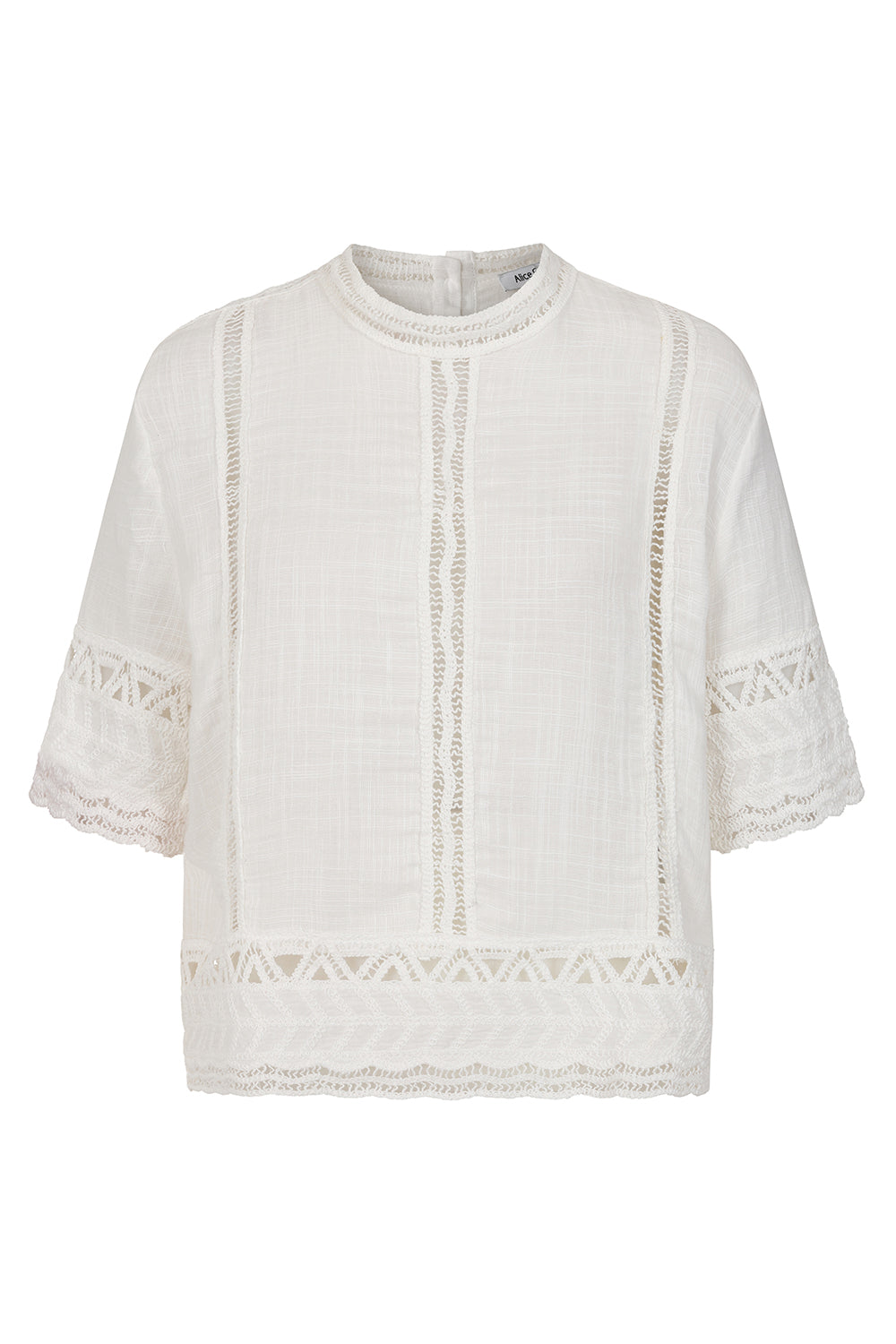 Francoise Top dress Woman wearing a beige outfit  White lace-trimmed blouse