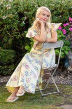 Buy Online Claudia Dress Alice Collins Woman in a floral dress