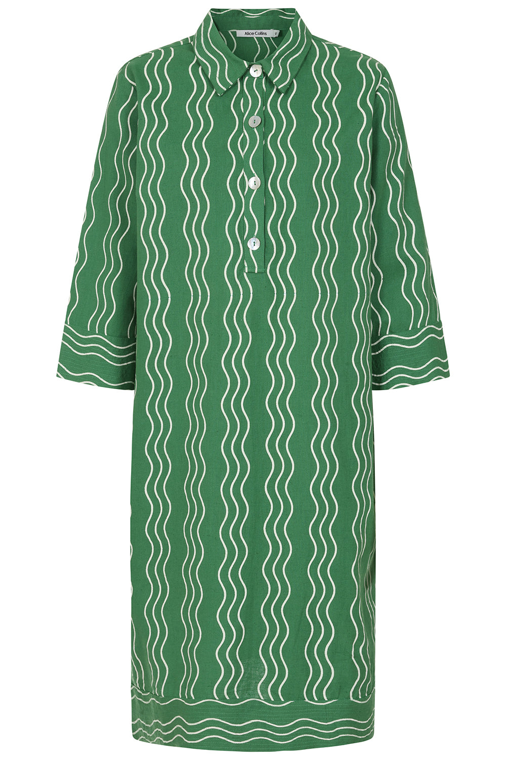 Buy Online Beth Wavy Dress Alice Collins Green Pepper dress with white wavy pattern on a white background