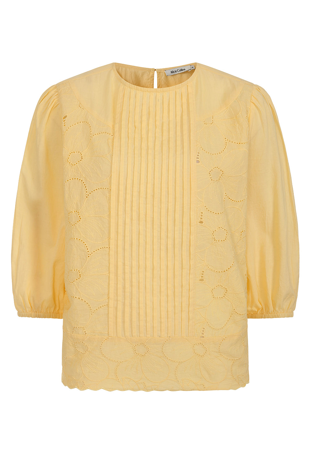 Buy Online Imogen Blouse Alice Collins Yellow blouse with intricate designs on a white background