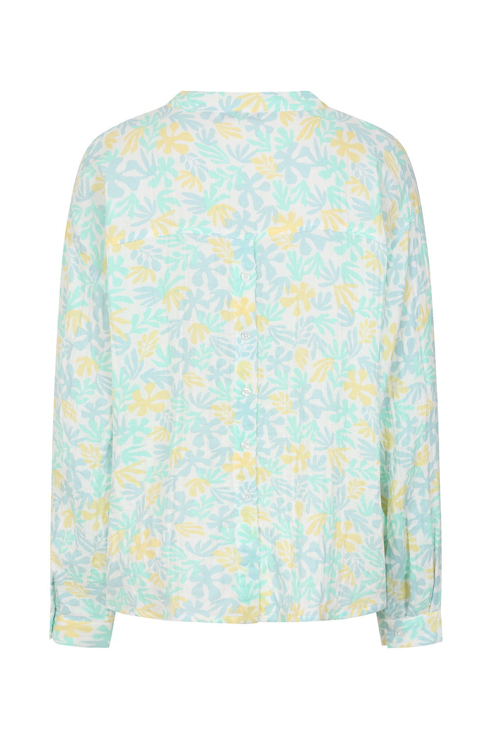Light blue blouse with yellow floral pattern on a white background