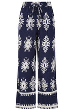 Buy Online Athena Trousers Alcie Collins -  Navy blue pants with white pattern on a white background