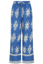 Buy Online Athena Trousers Alcie Collins -  Blue pants with white floral patterns on a white background
