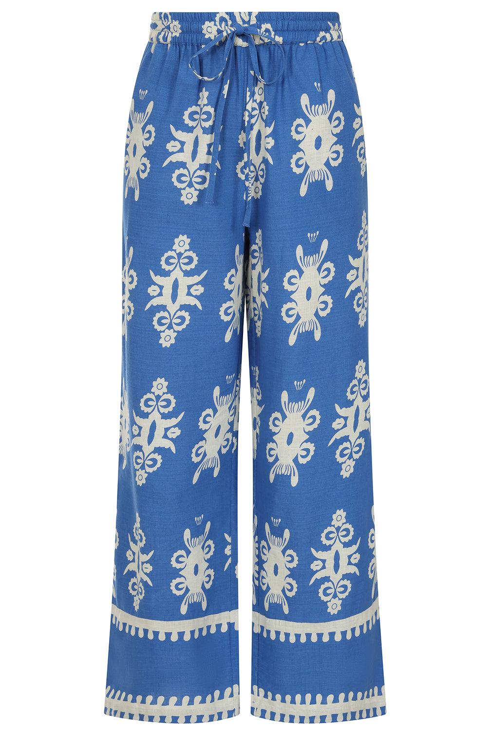 Buy Online Athena Trousers Alcie Collins -  Blue pants with white floral patterns on a white background